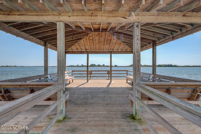 dock area with a water view