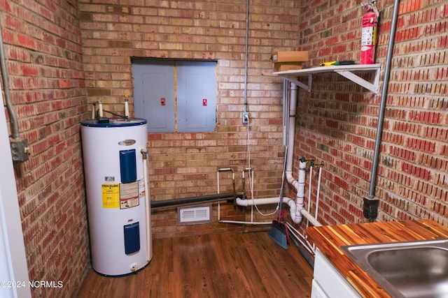 utility room with water heater and electric panel