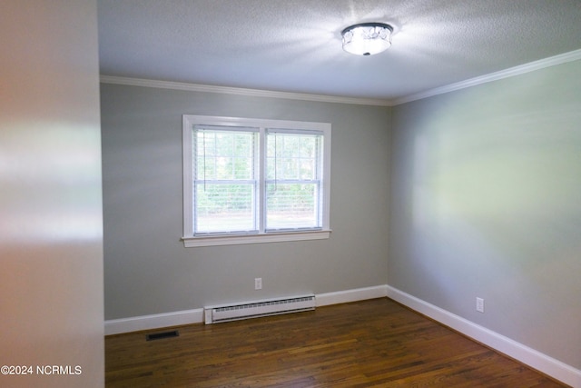 spare room featuring a baseboard radiator, crown molding, dark hardwood / wood-style flooring, and a textured ceiling