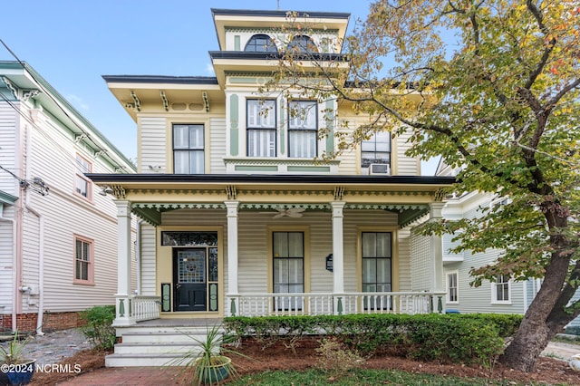 italianate-style house with covered porch