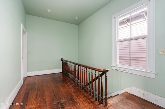 staircase featuring wood-type flooring