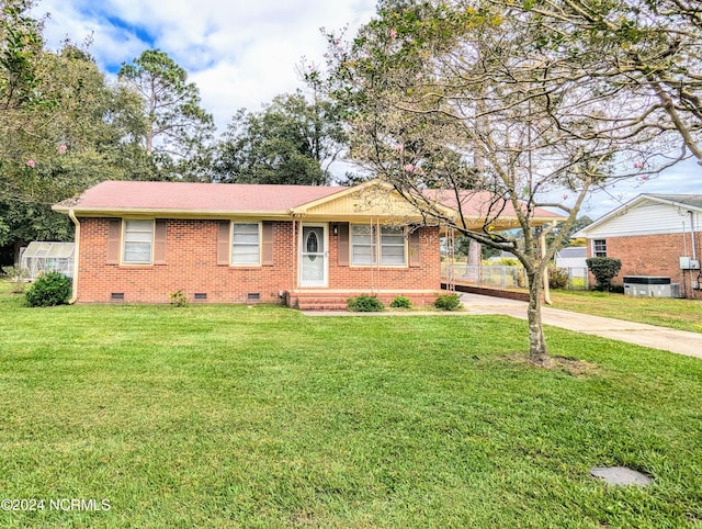 ranch-style house with a front yard