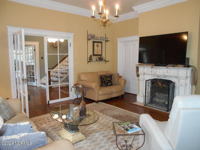 living room with crown molding, a chandelier, and dark wood-type flooring