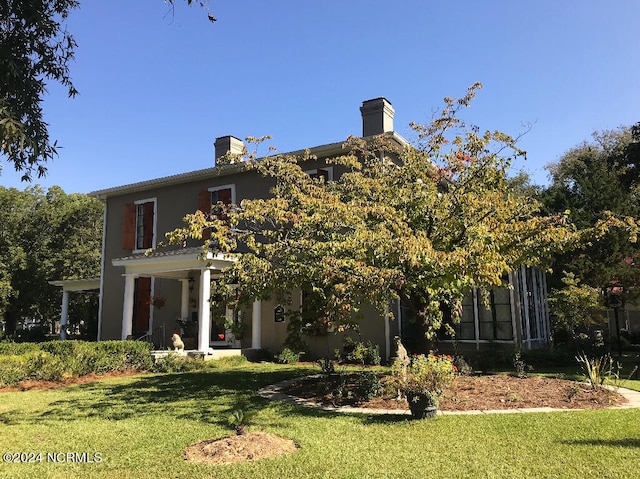 exterior space featuring a lawn