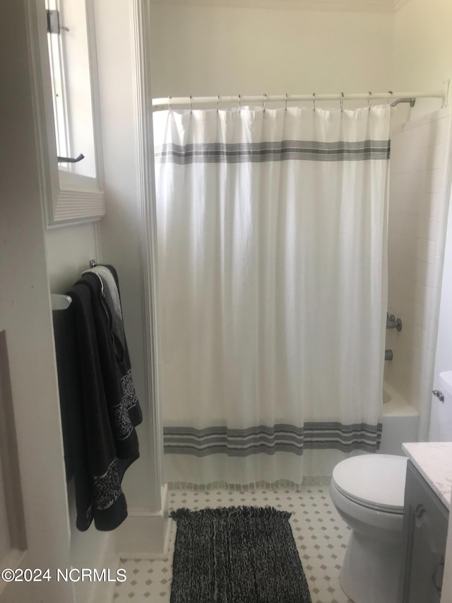 full bathroom with vanity, toilet, and shower / bath combo