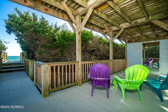 deck featuring a water view