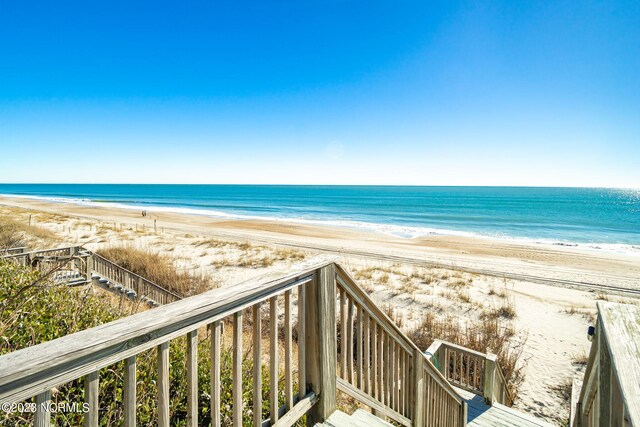 water view featuring a beach view