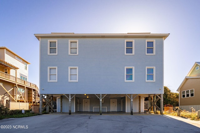 view of front facade with a carport