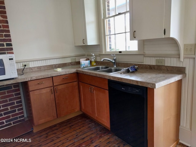 1222 National Ave, New Bern, NC 28560 - kitchen with dishwasher, white microwave, dark wood-style floors, light countertops, and brown cabinets