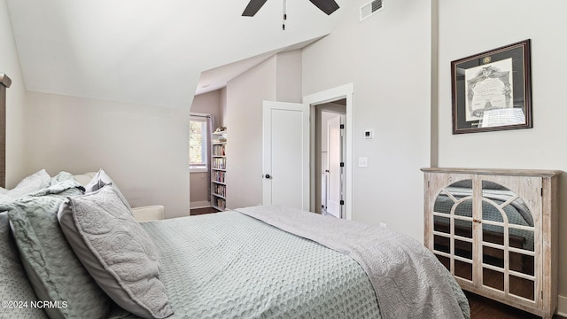 bedroom featuring ceiling fan and vaulted ceiling