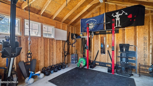 exercise room with lofted ceiling
