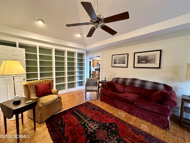 207 W Eden St, Edenton, NC 27932 - living room with wood finished floors, ceiling fan, built in shelves, recessed lighting, and lofted ceiling