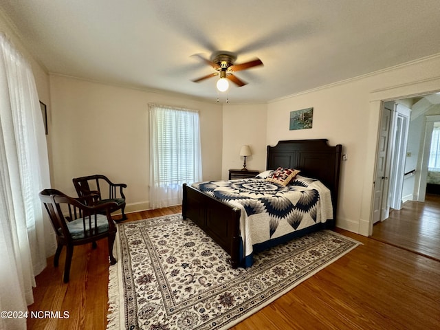207 W Eden St, Edenton, NC 27932 - bedroom featuring wood finished floors, crown molding, baseboards, and a ceiling fan