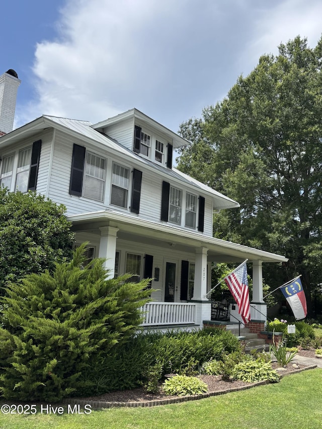 207 W Eden St, Edenton, NC 27932 - traditional style home featuring a porch and a chimney