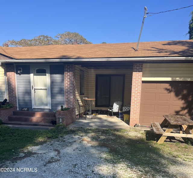 view of front of home with a garage