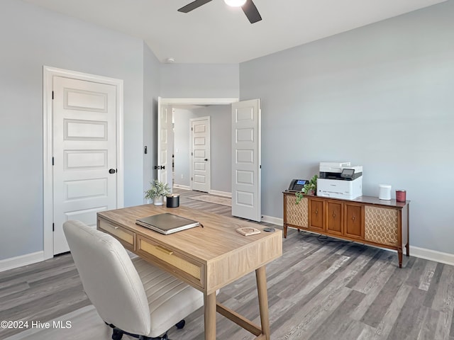 office featuring hardwood / wood-style flooring and ceiling fan