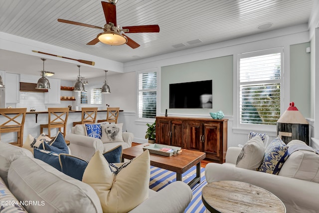 living room featuring ceiling fan