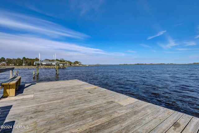 view of dock with a water view