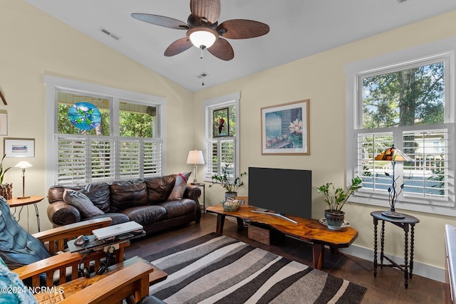 living room with dark hardwood / wood-style floors, ceiling fan, and lofted ceiling