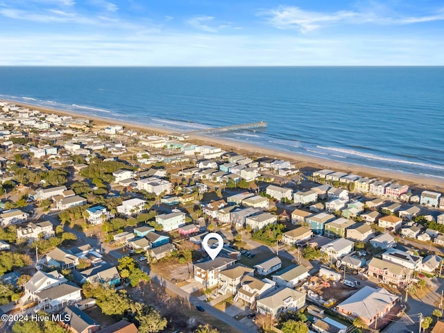 aerial view with a view of the beach and a water view