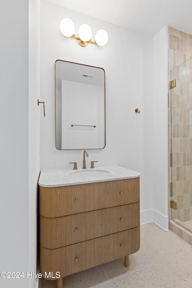 bathroom with vanity and walk in shower