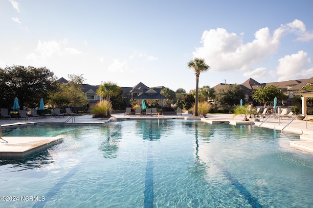 view of swimming pool featuring a patio