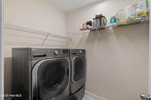 648 Village Park Dr Unit 203, Wilmington, NC 28405 - laundry room featuring washer and dryer and baseboards