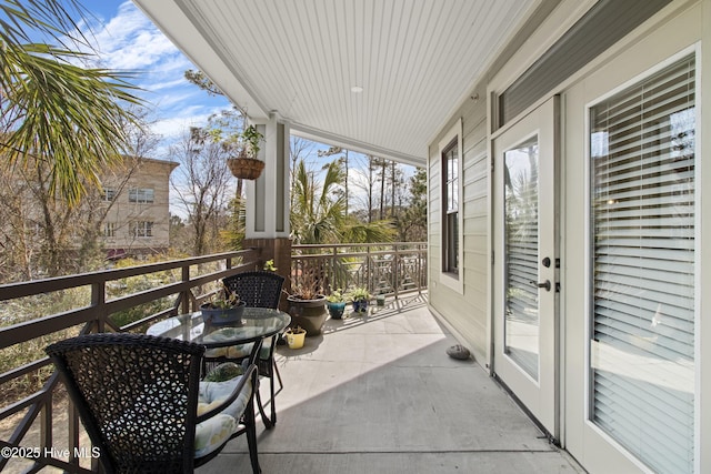 648 Village Park Dr Unit 203, Wilmington, NC 28405 - balcony with outdoor dining area