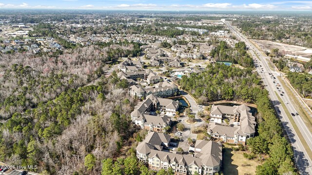 648 Village Park Dr Unit 203, Wilmington, NC 28405 - view of property location featuring nearby suburban area, a highway, and a tree filled landscape