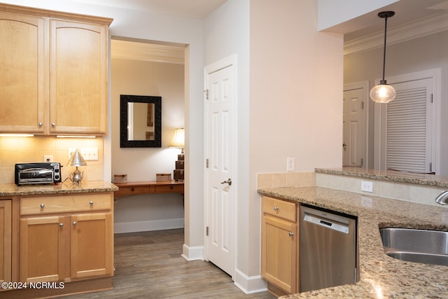 kitchen with wood-type flooring, sink, light stone countertops, hanging light fixtures, and stainless steel dishwasher