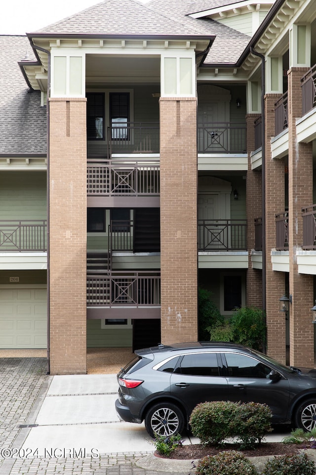 view of building exterior featuring a garage