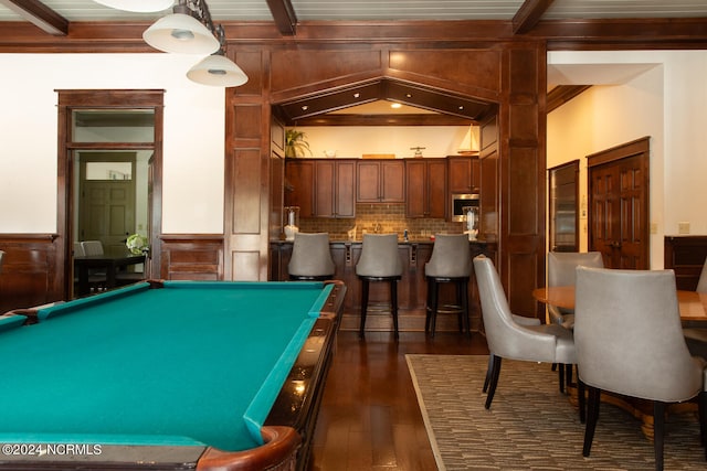 recreation room with beamed ceiling, dark wood-type flooring, and billiards