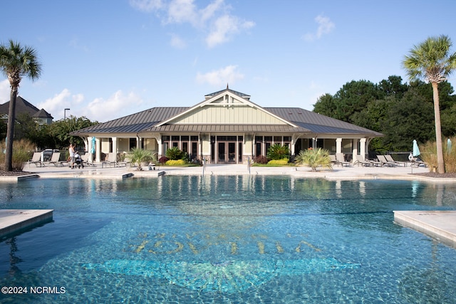 view of pool featuring a patio area