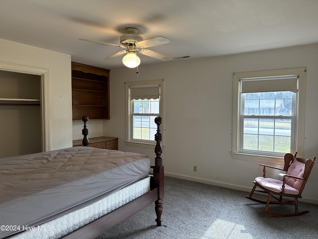 bedroom with ceiling fan, a closet, and carpet floors