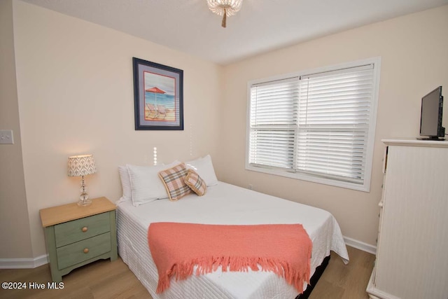 bedroom featuring wood-type flooring