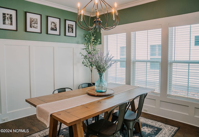 dining room with crown molding, a wealth of natural light, a notable chandelier, and dark hardwood / wood-style flooring