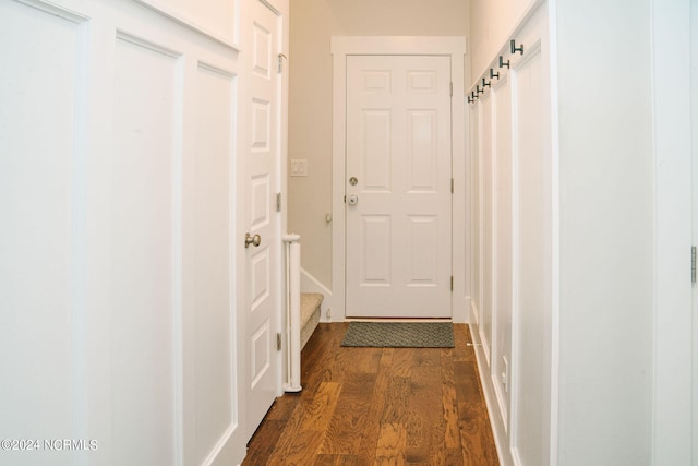 doorway to outside featuring dark hardwood / wood-style flooring