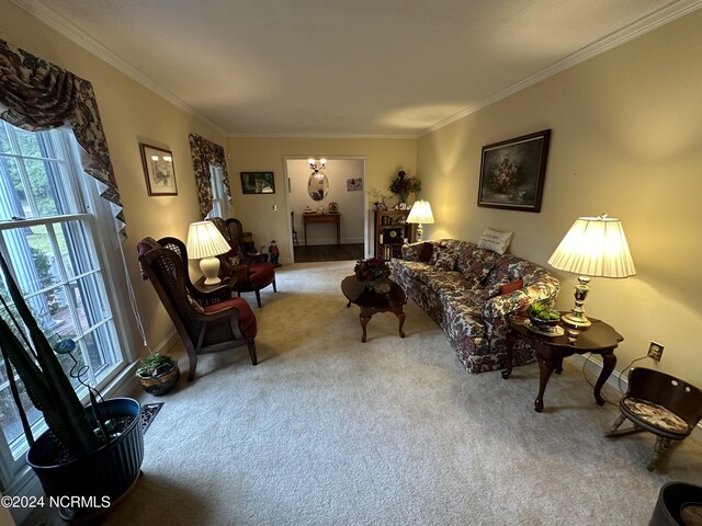 carpeted living room with ornamental molding