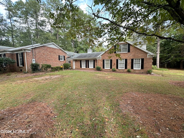 view of front of house featuring a front yard