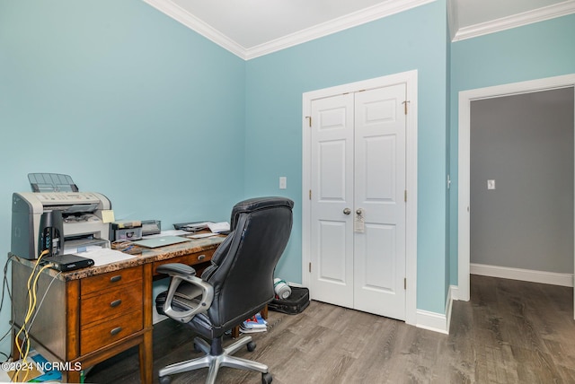 office with wood-type flooring and ornamental molding