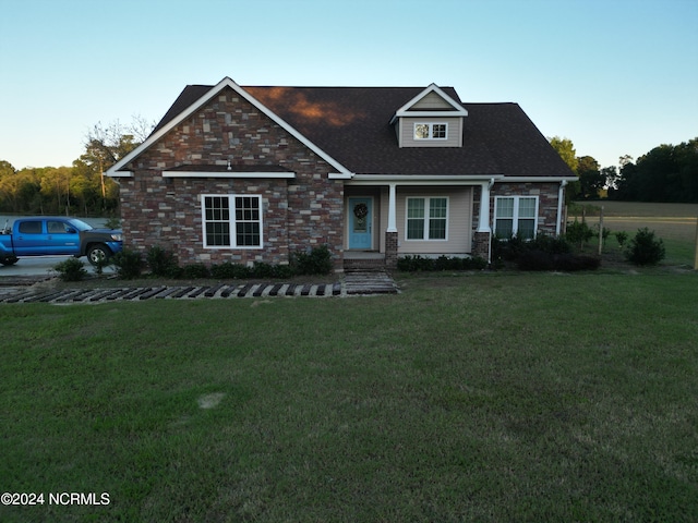 view of front facade with a front yard