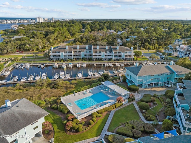 birds eye view of property featuring a water view