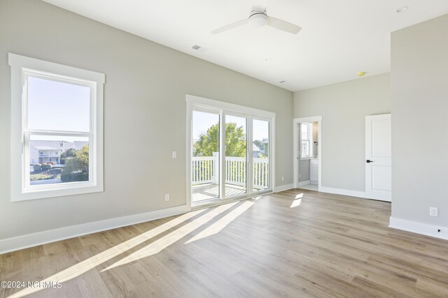 empty room featuring light hardwood / wood-style floors and ceiling fan