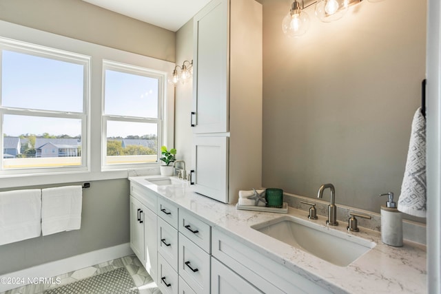 bathroom with vanity and tile patterned floors