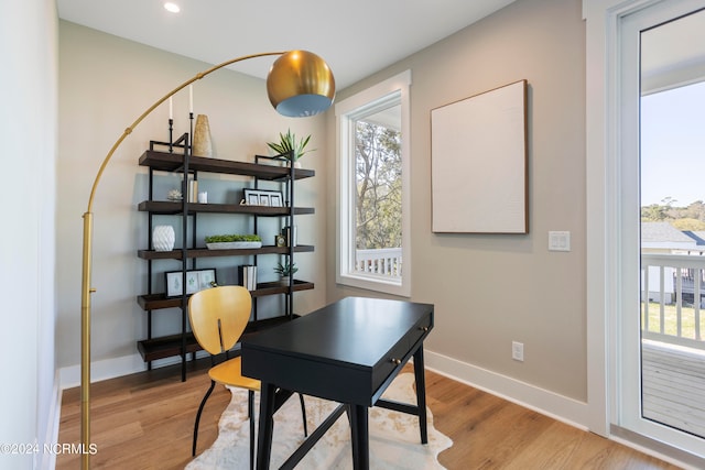 home office with light wood-type flooring