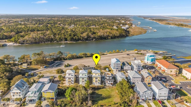 bird's eye view featuring a residential view and a water view