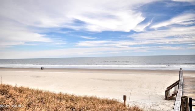 view of water feature with a beach view