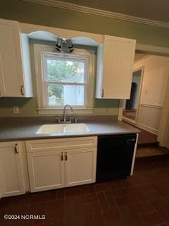 kitchen featuring white cabinets and black dishwasher