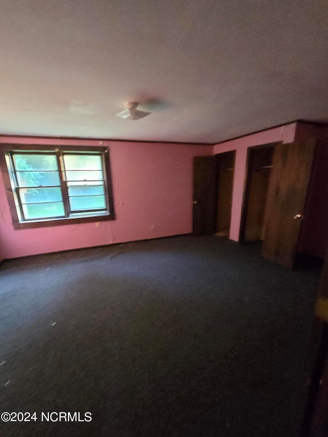 unfurnished bedroom featuring carpet floors