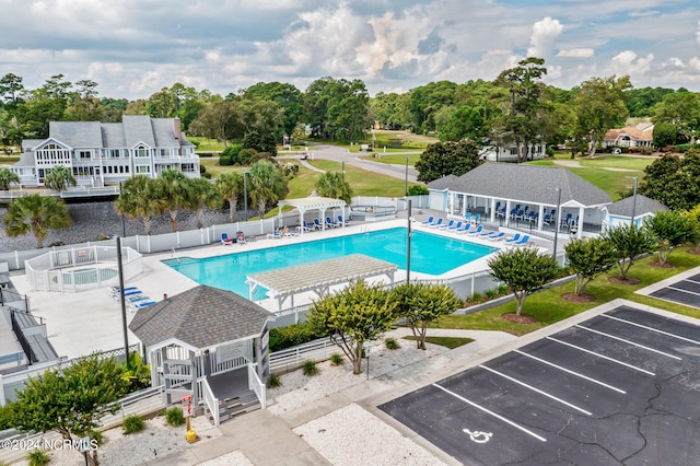 view of swimming pool with a patio